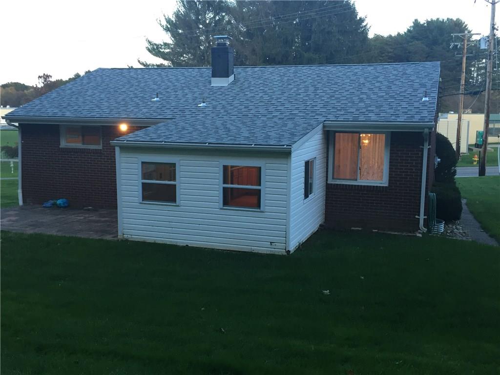 52 East Union Road Cheswick, PA 15024 - Photo 5 of 15 a front view of a house with a yard