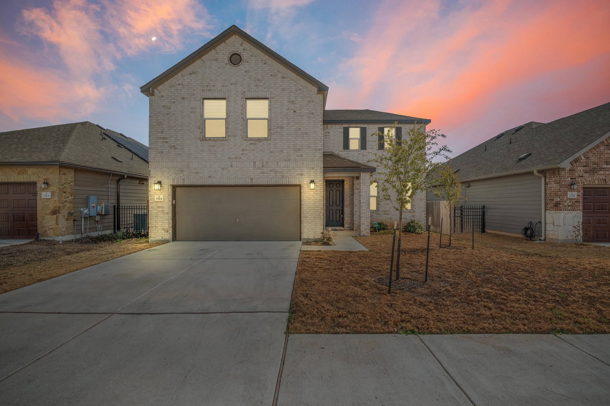 7715 Libretto Lane Austin, TX 78744 - Photo 1 of 39 Contemporary greenbelt living in McKinney Crossing, a newer SE Austin community.