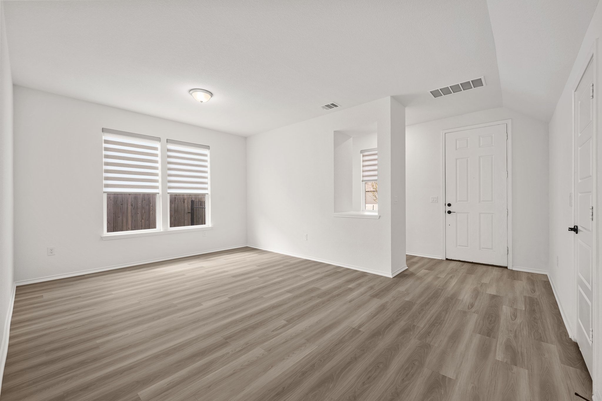 7715 Libretto Lane Austin, TX 78744 - Photo 12 of 39 This bonus main floor living or formal dining room provides you with ample room to stretch out.