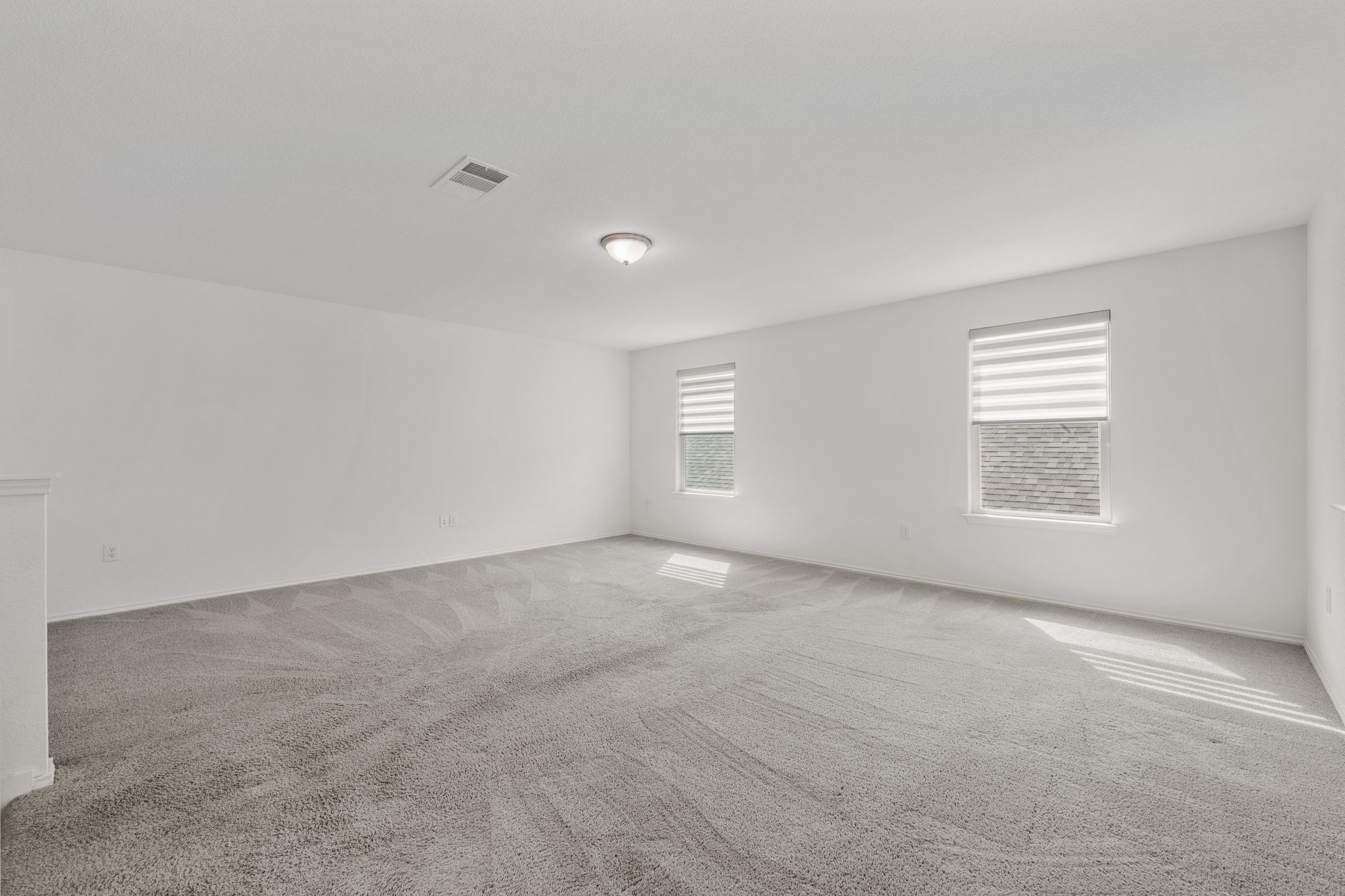 7715 Libretto Lane Austin, TX 78744 - Photo 19 of 39 There's ample space for configuring a media area, playroom, study area, fitness equipment and more.