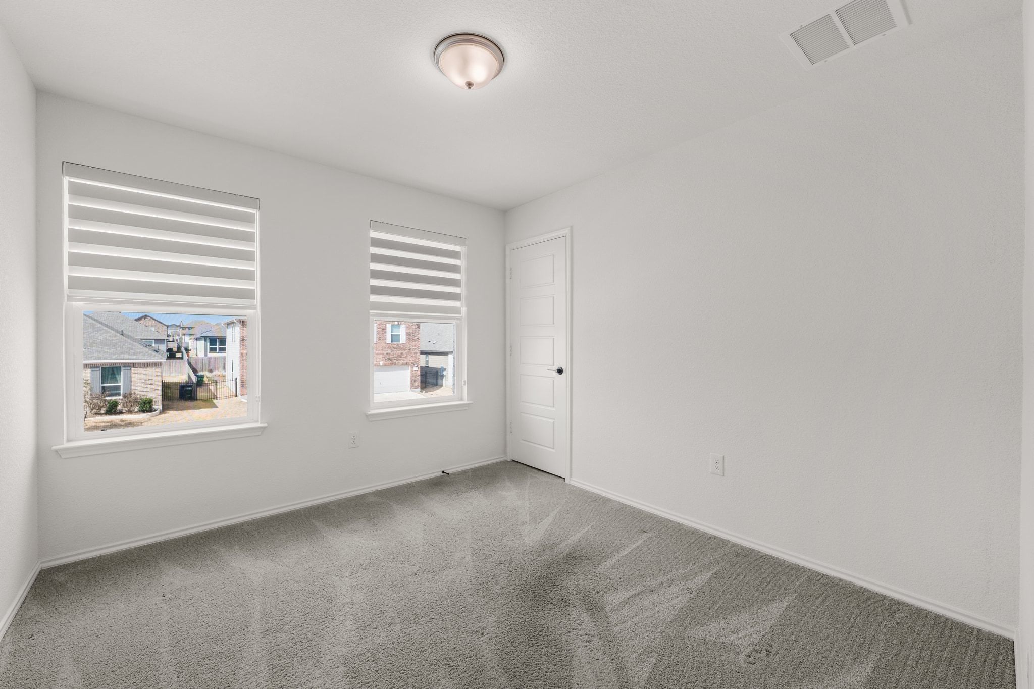 7715 Libretto Lane Austin, TX 78744 - Photo 22 of 39 One of three secondary bedrooms located upstairs.