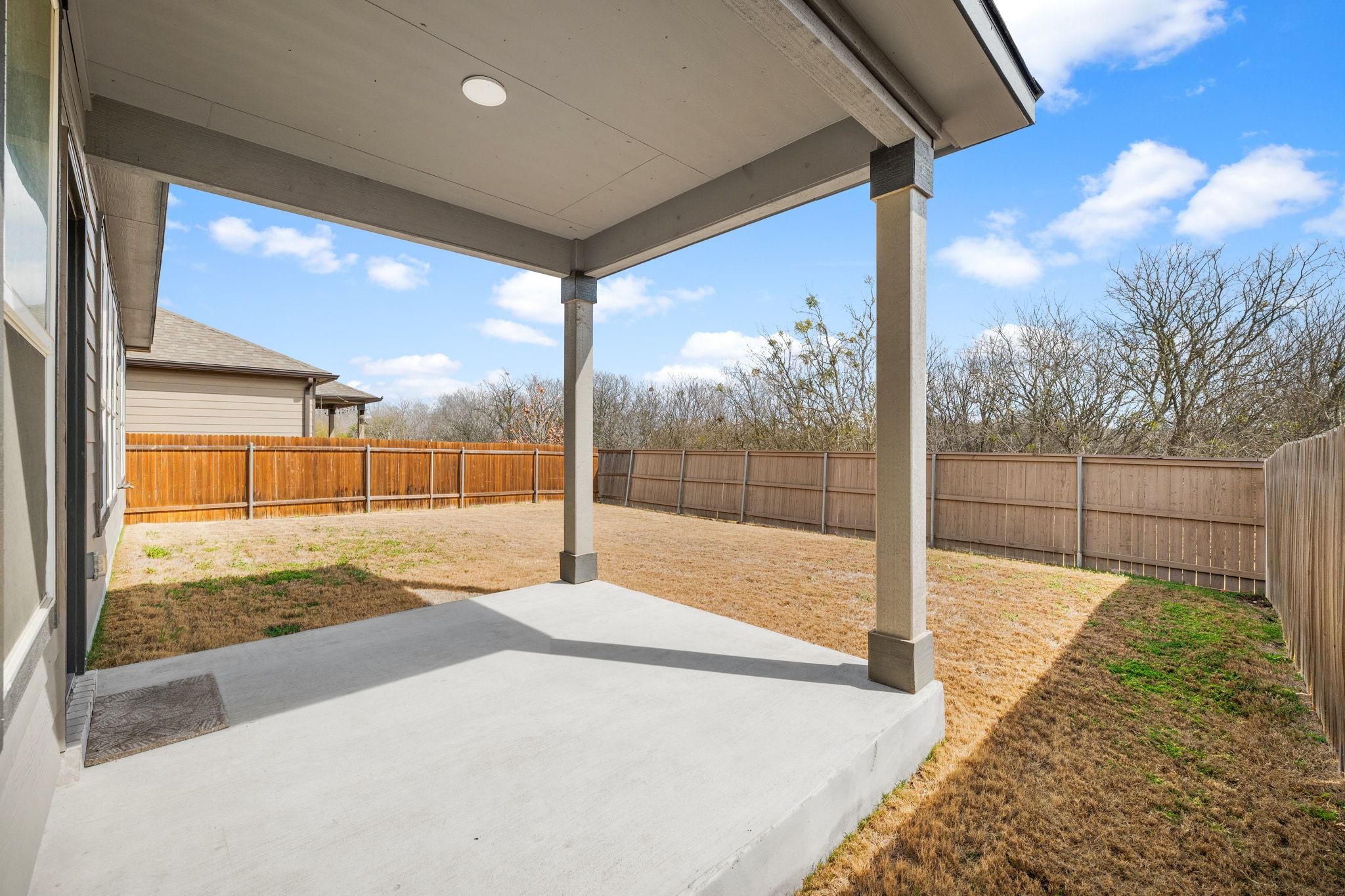 7715 Libretto Lane Austin, TX 78744 - Photo 30 of 39 The covered patio provides space to relax or even expand further.