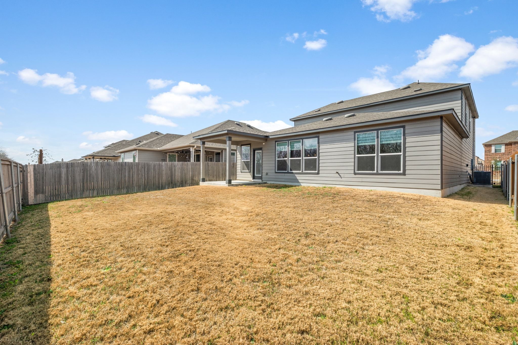 7715 Libretto Lane Austin, TX 78744 - Photo 31 of 39 The backyard is a blank slate ready for your ideal customization.