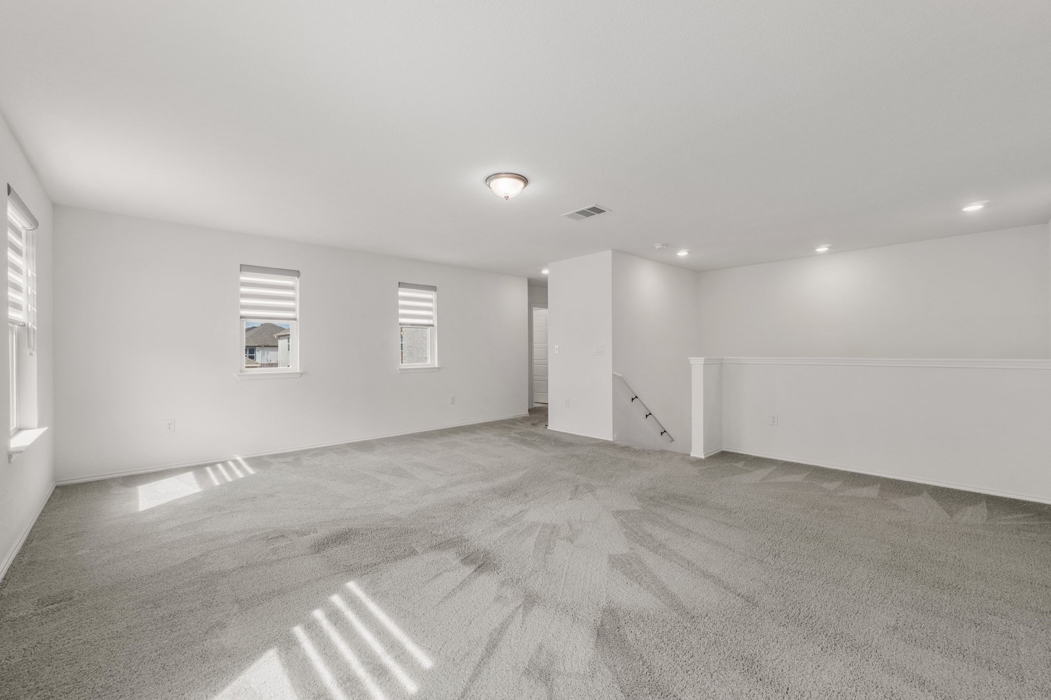 7715 Libretto Lane Austin, TX 78744 - Photo 5 of 39 Upstairs you will find three secondary bedrooms along with this awesome oversized bonus living area.