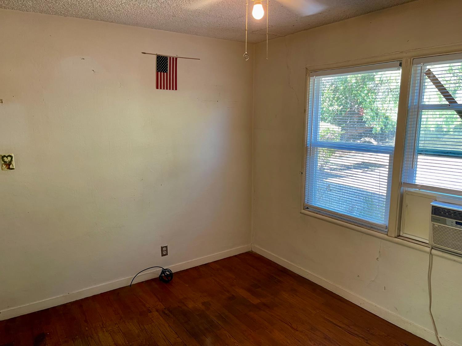 1736 6th Street Concord, CA 94519 - Photo 42 of 64 a view of a small space with wooden floor and a window