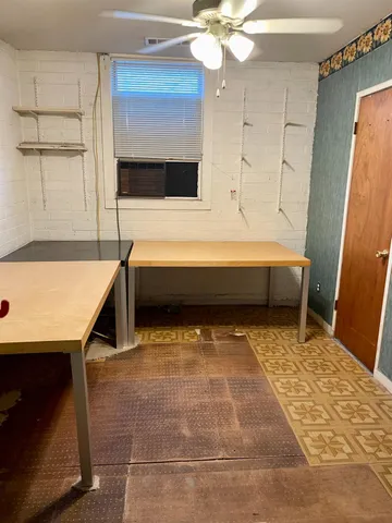 a view of a yard with a tree