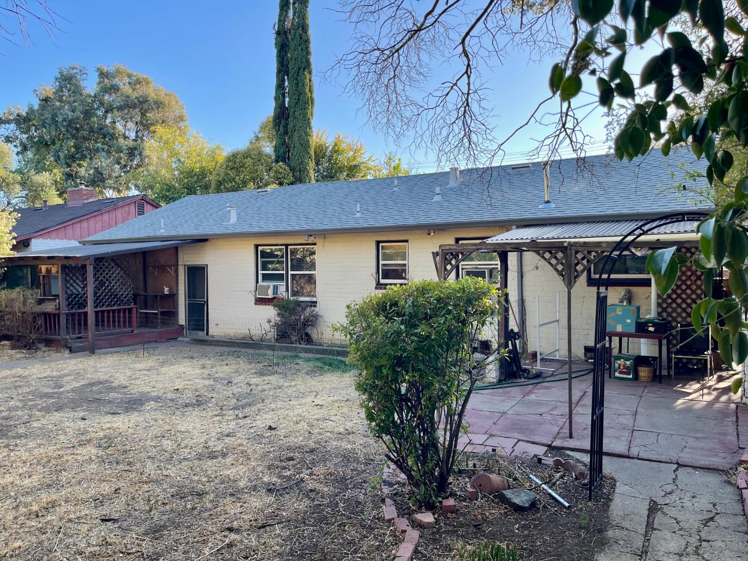 1736 6th Street Concord, CA 94519 - Photo 55 of 64 a view of a house with backyard sitting area and garden