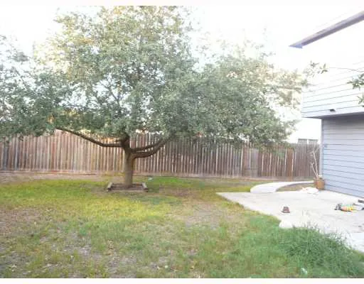 a swimming pool with wooden fence