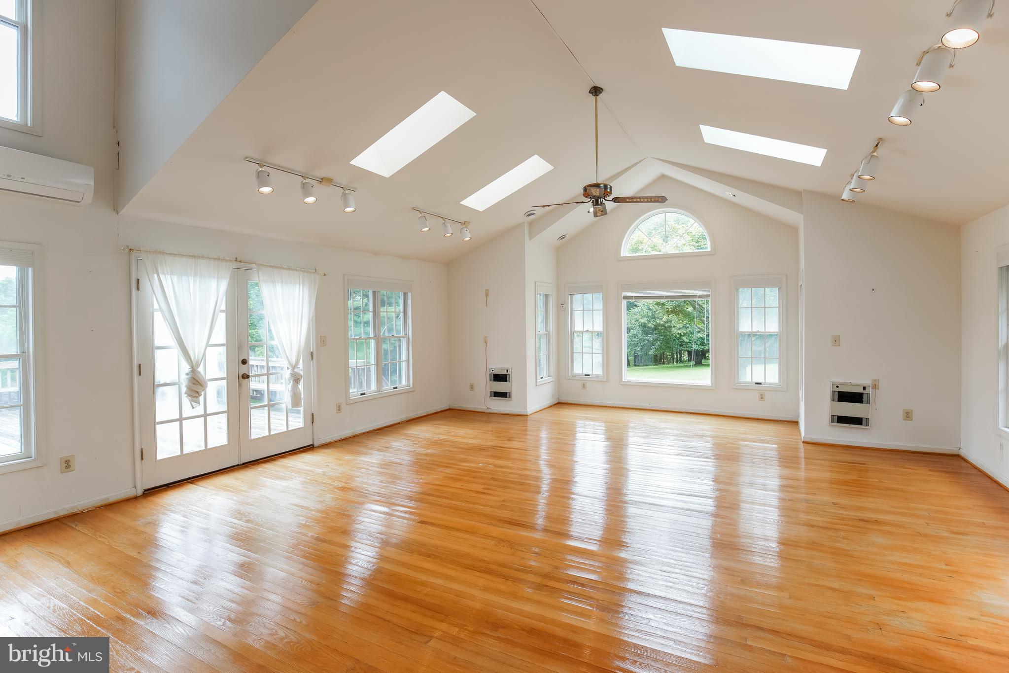 12320 Rivers Edge Drive Potomac, MD 20854 - Photo 14 of 23 Two Story Sun room w/Skylights