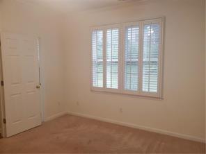 3715 Ridgeside Court Suwanee, GA 30024 - Photo 12 of 33 an empty room with a window