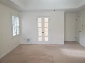 an empty room with windows