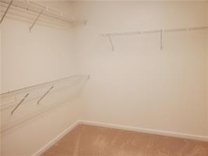 3715 Ridgeside Court Suwanee, GA 30024 - Photo 28 of 33 a view of small space with racks on the wall