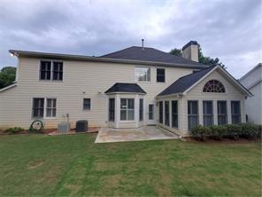 3715 Ridgeside Court Suwanee, GA 30024 - Photo 29 of 33 a front view of a house with a garden