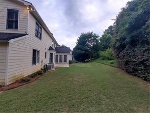 3715 Ridgeside Court Suwanee, GA 30024 - Photo 31 of 33 a view of a house with a yard
