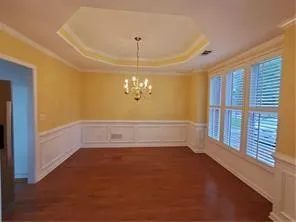 a view of room with window and ceiling fan