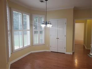3715 Ridgeside Court Suwanee, GA 30024 - Photo 6 of 33 a view of empty room with wooden floor and fan
