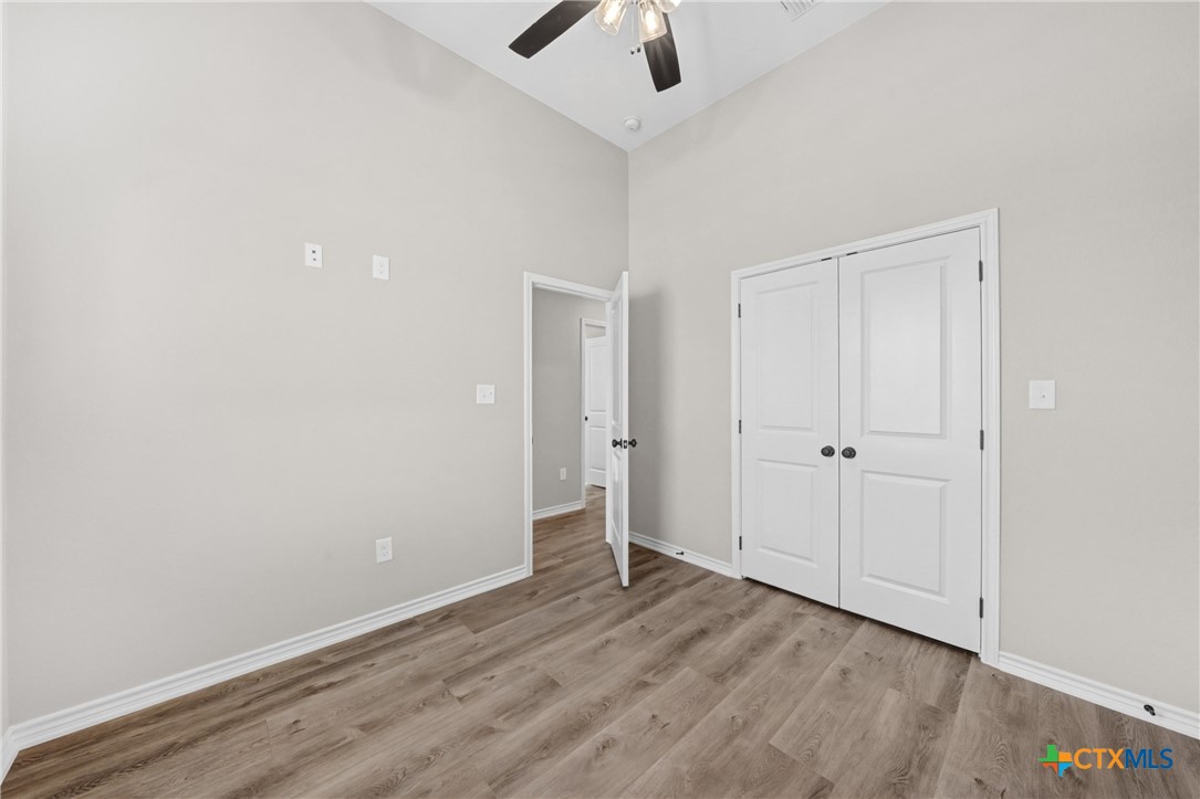 604 Magnolia Drive Troy, TX 76579 - Photo 16 of 33 wooden floor in an empty room