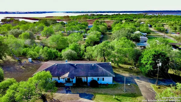 a view of a house with a big yard