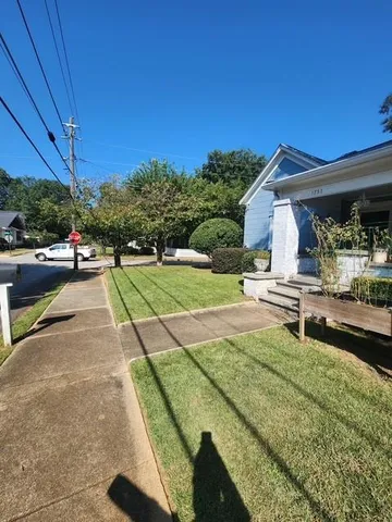a swimming pool with barbeque oven