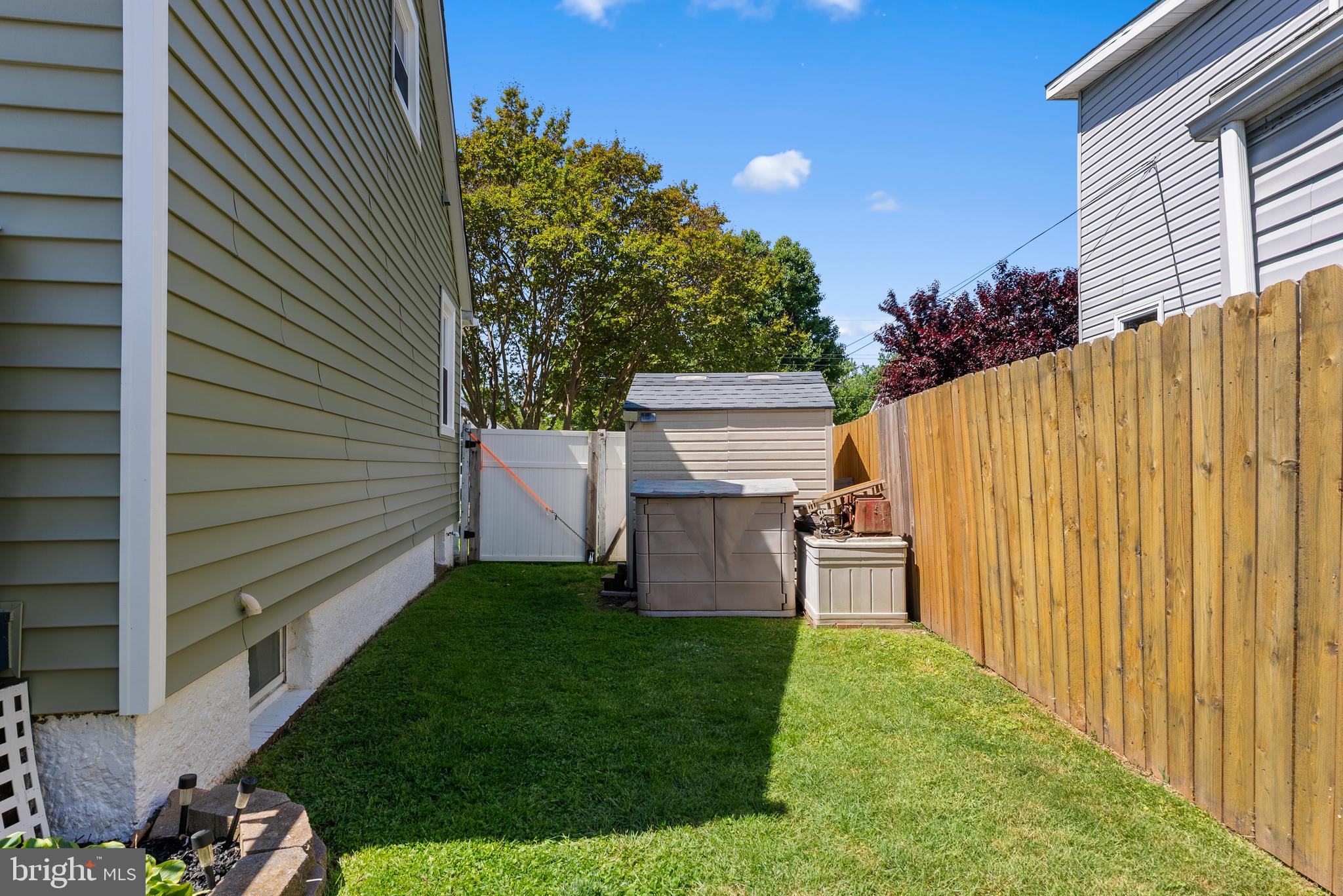 70 Del Rio Road Baltimore, MD 21222 - Photo 30 of 40 a view of a backyard with plants and a patio