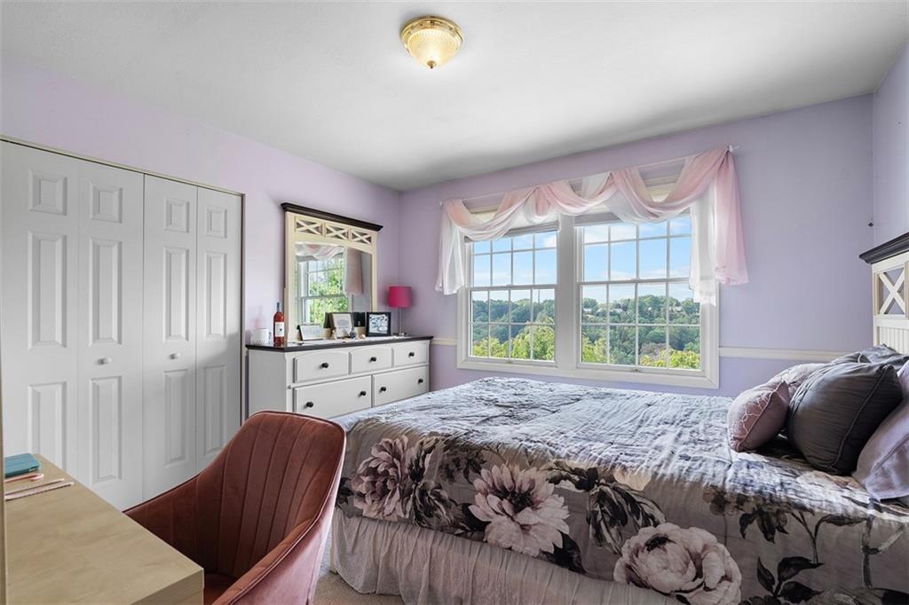 247 Randy Lane Coraopolis, PA 15108 - Photo 20 of 39 a bedroom with a large bed and a window