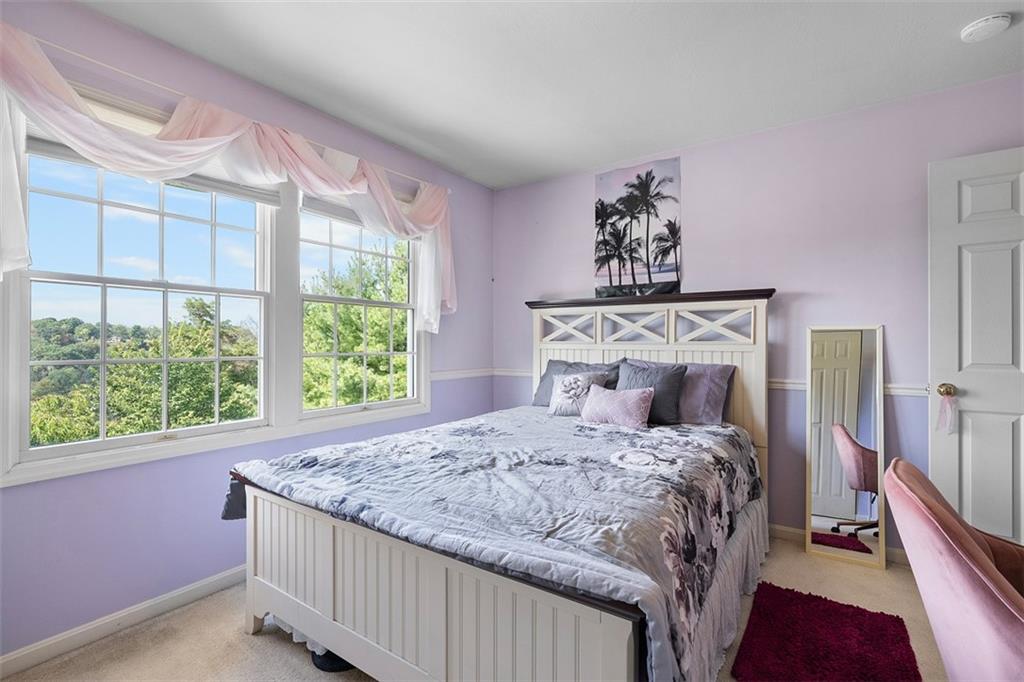 247 Randy Lane Coraopolis, PA 15108 - Photo 21 of 39 a bedroom with a bed and a large window