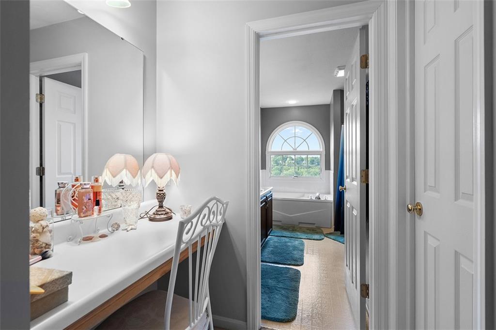 247 Randy Lane Coraopolis, PA 15108 - Photo 23 of 39 a view of a dining room with furniture and a chandelier