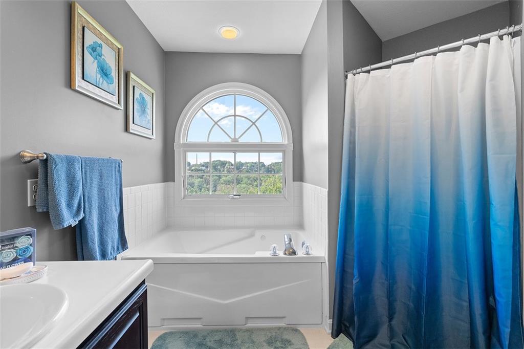 247 Randy Lane Coraopolis, PA 15108 - Photo 25 of 39 a bathroom with a bathtub and a sink