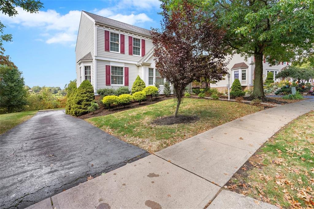247 Randy Lane Coraopolis, PA 15108 - Photo 3 of 39 a front view of a house with garden