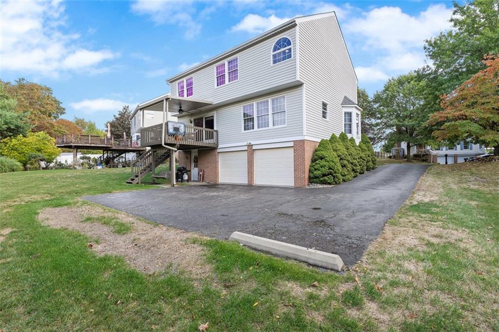 247 Randy Lane Coraopolis, PA 15108 - Photo 39 of 39 a front view of a house with garden