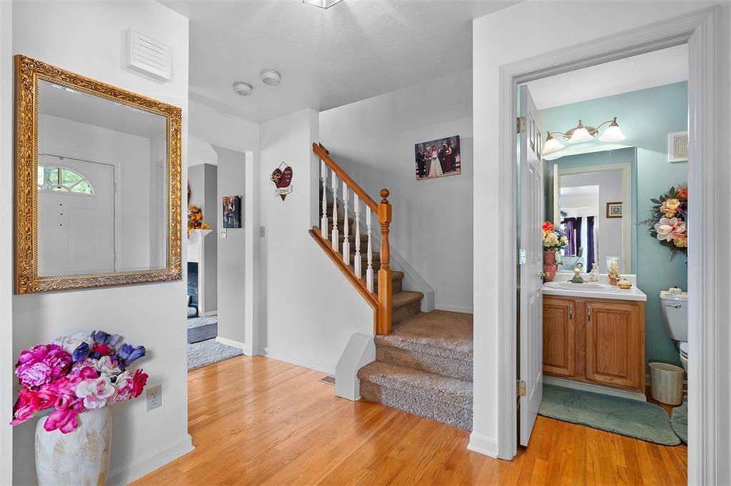 247 Randy Lane Coraopolis, PA 15108 - Photo 6 of 39 a view of a livingroom with wooden floor and furniture