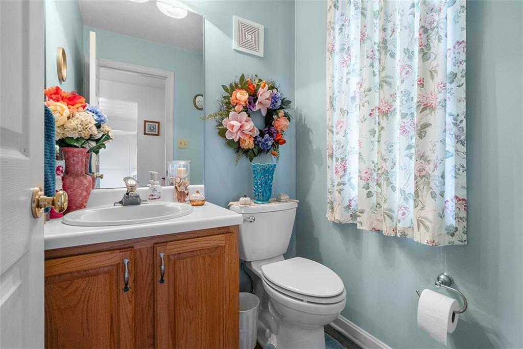 247 Randy Lane Coraopolis, PA 15108 - Photo 7 of 39 a bathroom with a sink toilet and a mirror