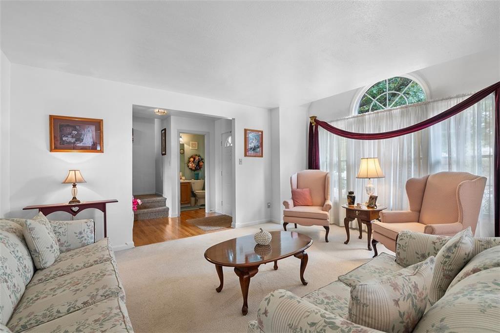247 Randy Lane Coraopolis, PA 15108 - Photo 9 of 39 a living room with furniture and a large window