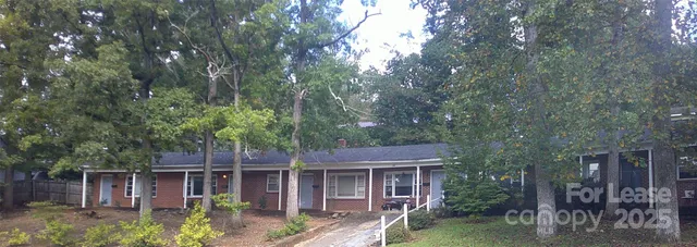front view of house with a tree