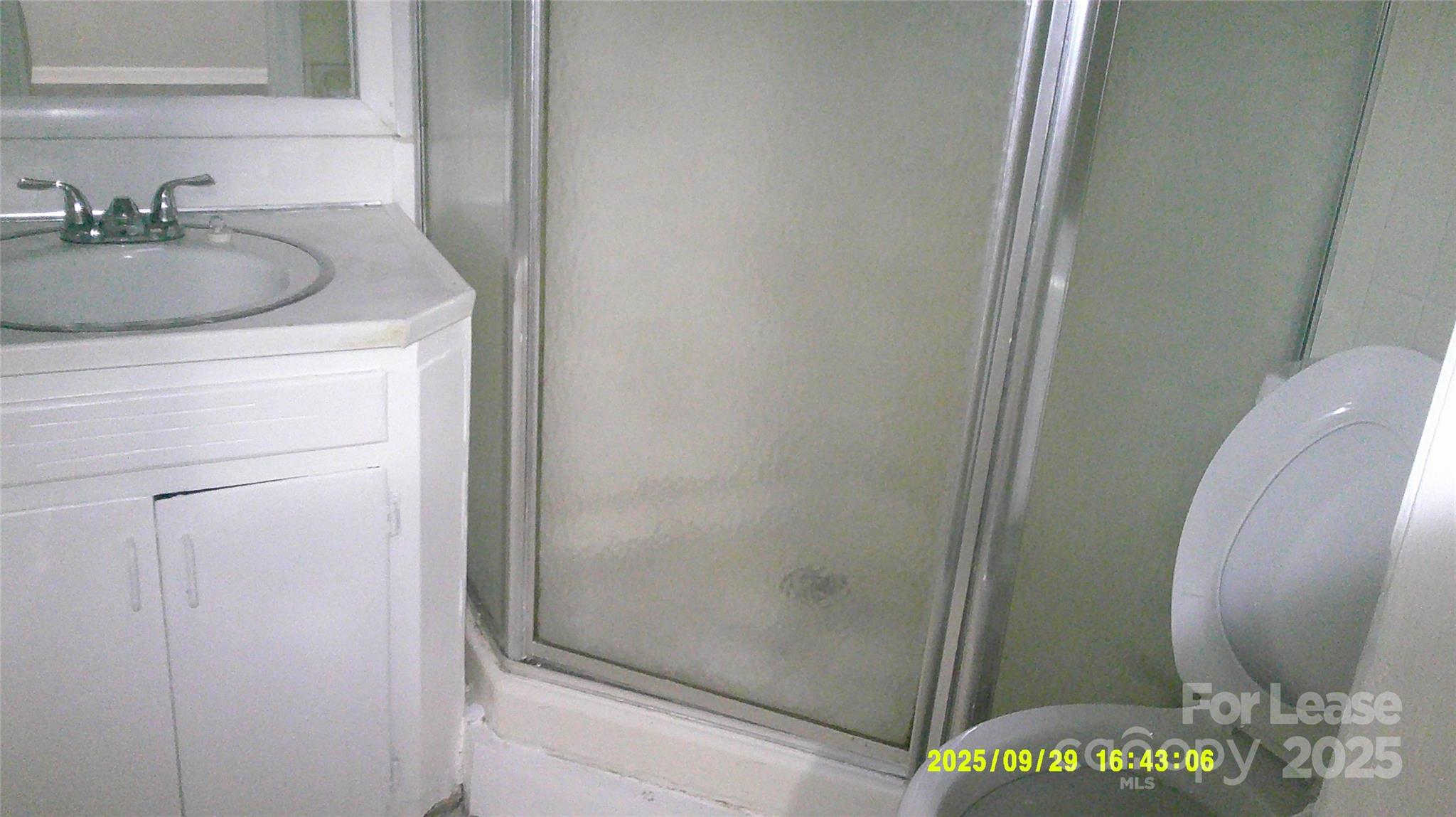 435 Arlington Circle Northwest, Unit E Lenoir, NC 28645 - Photo 7 of 7 a bathroom with a sink and a mirror