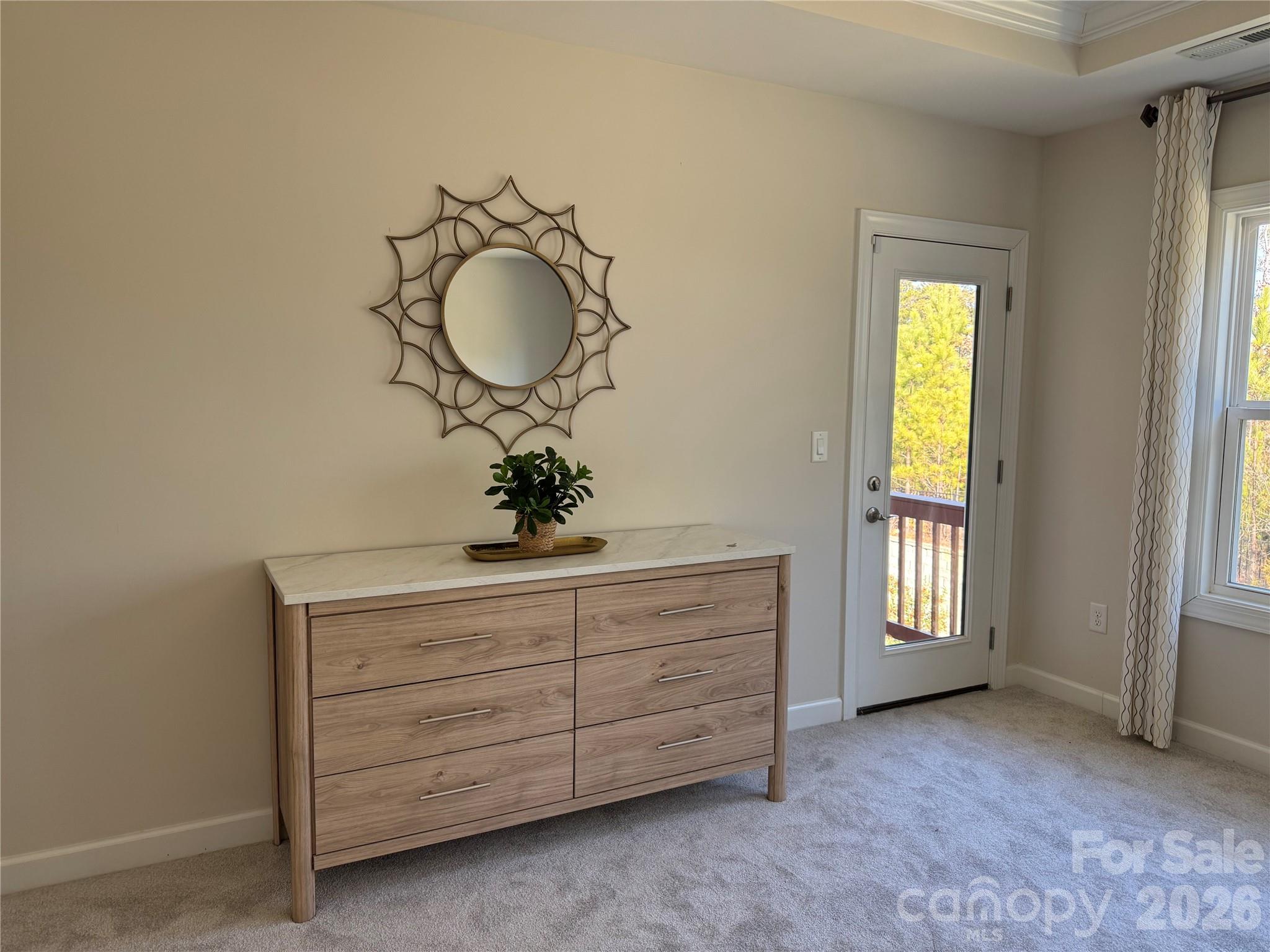 374 Hampton Trail Drive Fort Mill, SC 29708 - Photo 26 of 46 a room with a mirror and a sink