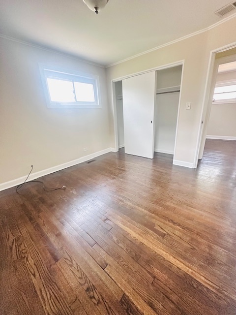9508 South Green Street Chicago, IL 60643 - Photo 7 of 47 wooden floor in an empty room with a window