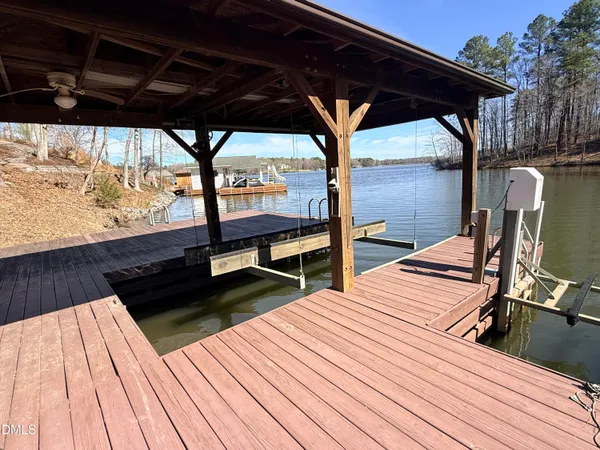 a view of balcony with wooden floor