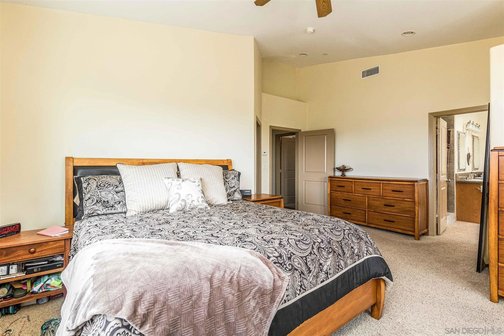 29482 Paso Robles Road Valley Center, CA 92082 - Photo 29 of 37 a bedroom with a bed and dresser