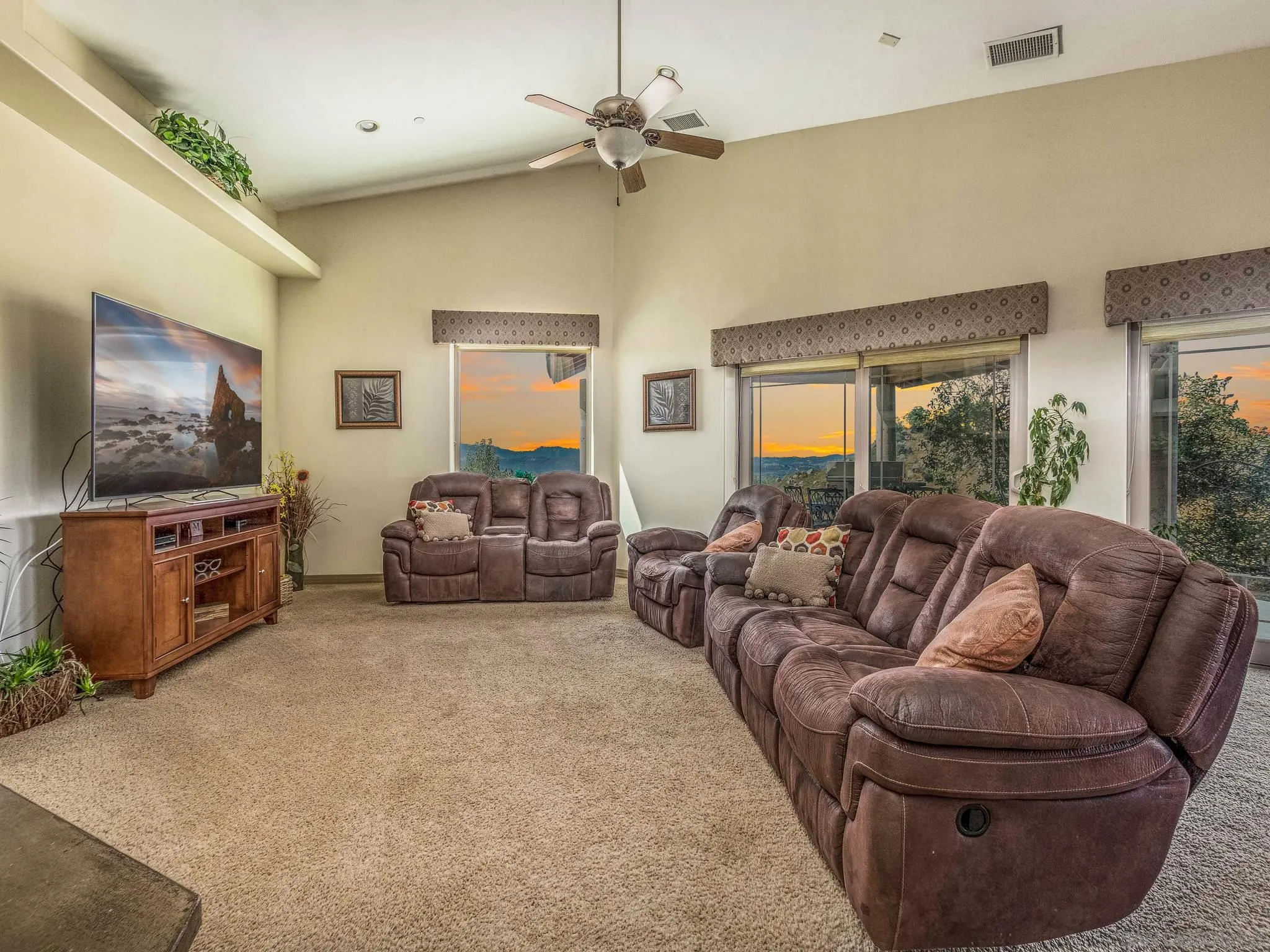 29482 Paso Robles Road Valley Center, CA 92082 - Photo 6 of 37 a living room with furniture and a flat screen tv