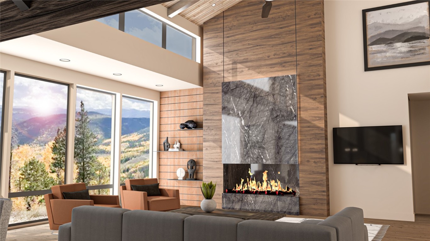 9 Rounds Road Breckenridge, CO 80424 - Photo 2 of 15 Living room featuring wood finished floors, a high end fireplace, high vaulted ceiling, and beam ceiling