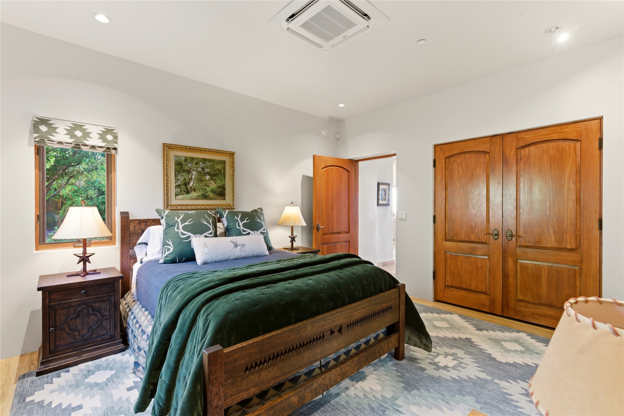 1008 South Summit Ridge Santa Fe, NM 87501 - Photo 29 of 42 Second bedroom with large closet and adjacent bath.