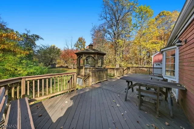 a view of a balcony with chairs