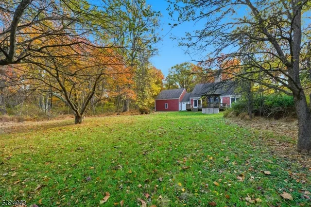 a house with trees in front of it