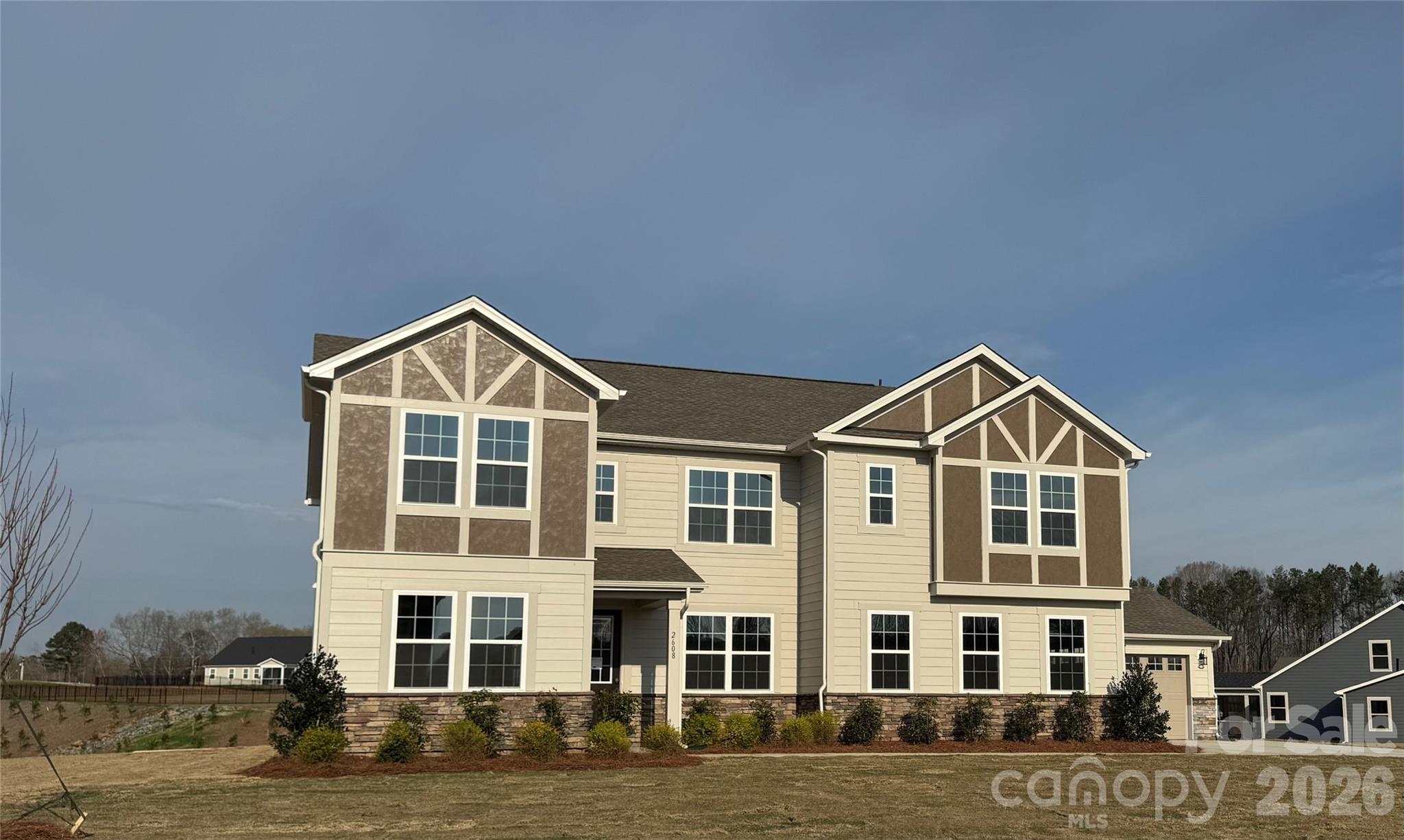 2608 Mabel Lane Monroe, NC 28110 - Photo 1 of 36 a front of a house with a yard