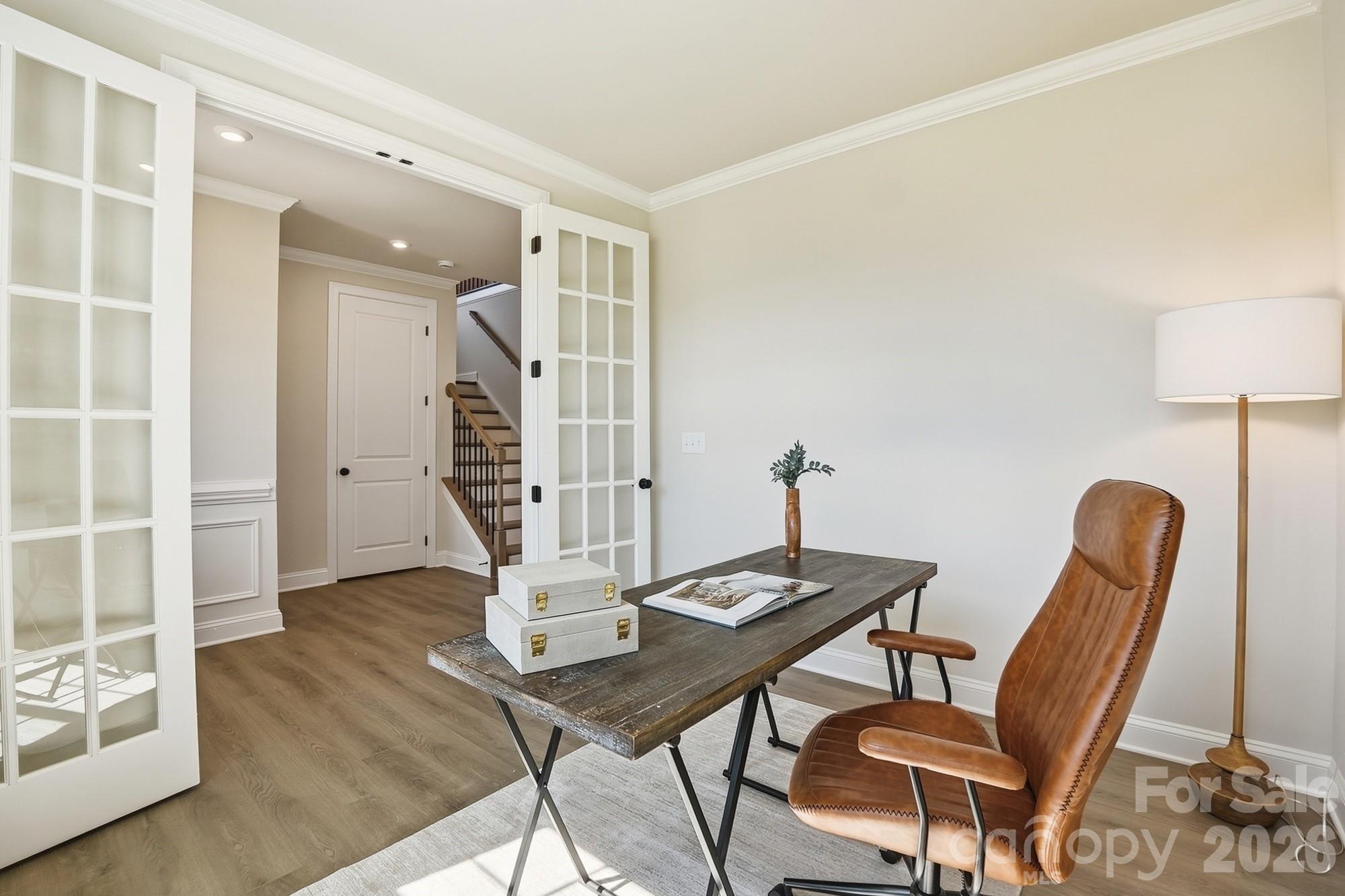 2608 Mabel Lane Monroe, NC 28110 - Photo 16 of 36 a view of a livingroom with furniture and a table