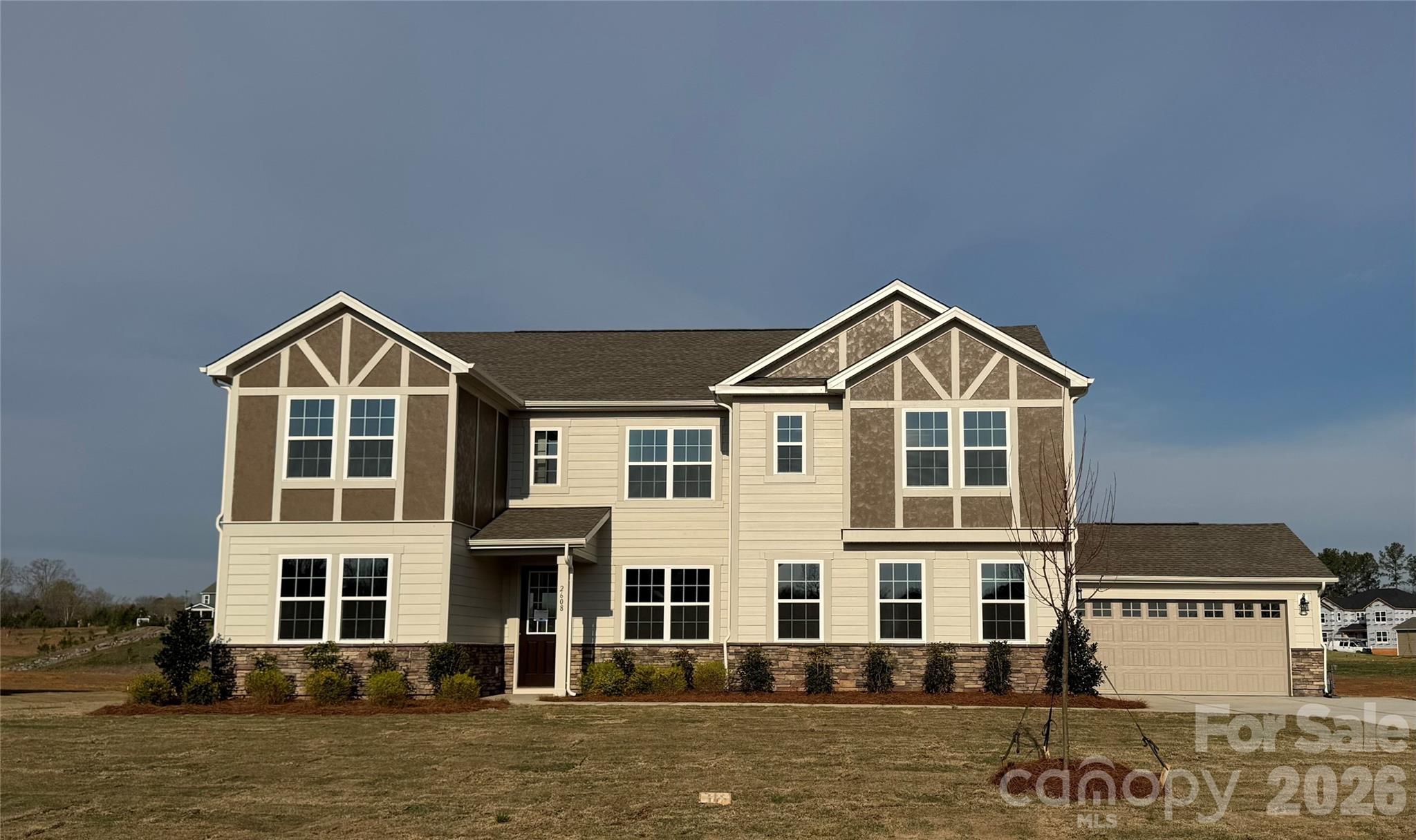 2608 Mabel Lane Monroe, NC 28110 - Photo 2 of 36 a front view of a house with a yard