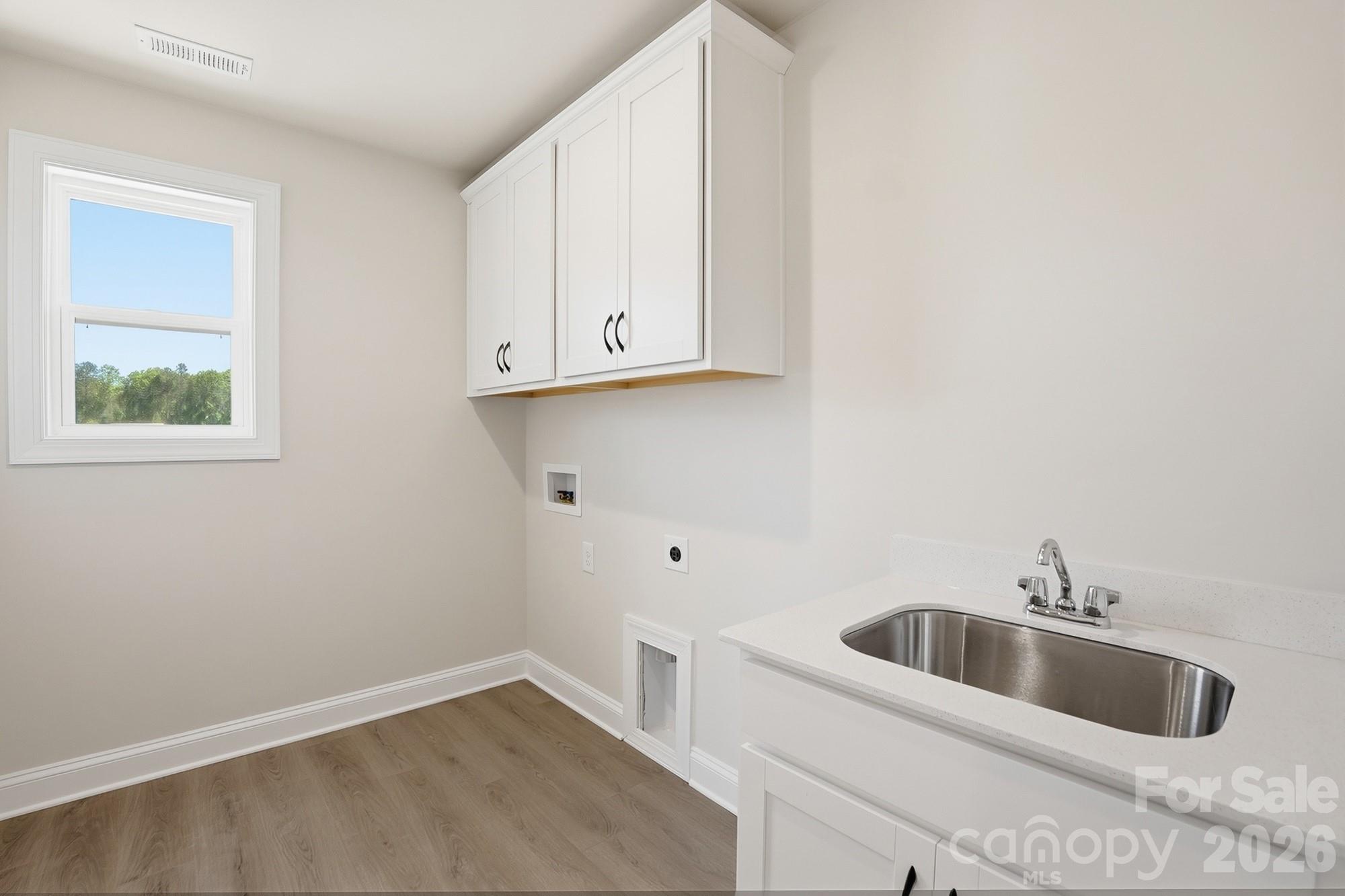 2608 Mabel Lane Monroe, NC 28110 - Photo 24 of 36 a view of a sink and cabinets