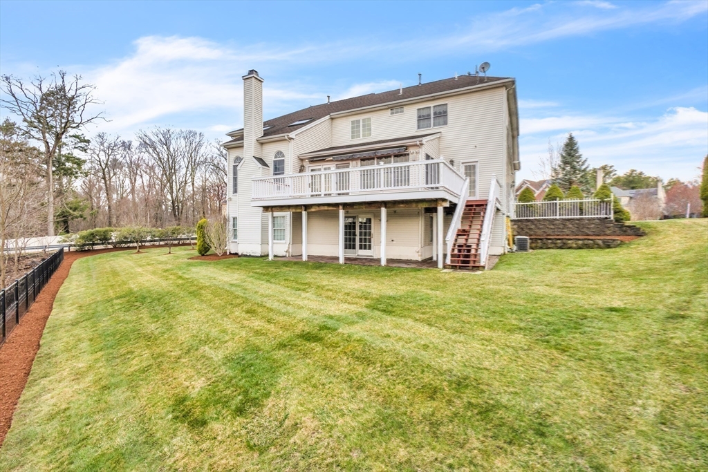 45 Endean Drive Walpole, MA 02032 - Photo 38 of 42 a front view of a house with a yard