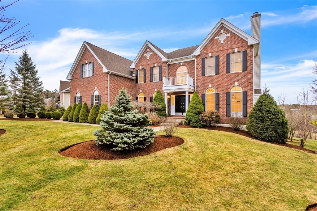 45 Endean Drive Walpole, MA 02032 - Photo 42 of 42 a front view of a house with a yard